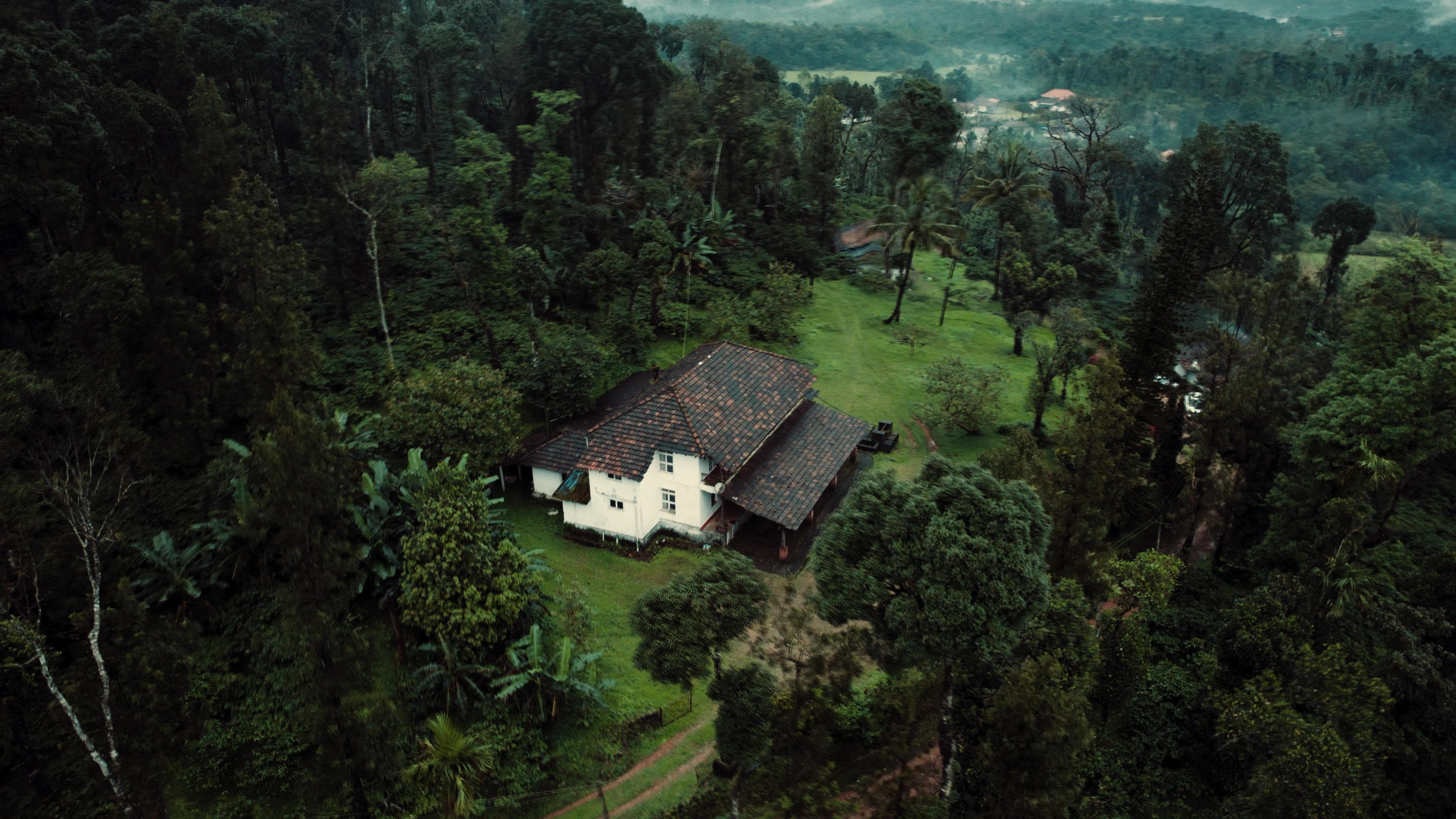 Aerial view of the Amyra Farms estate in the misty Western Ghats